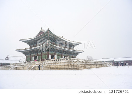 Winter snow at Gyeongbokgung Palace in Seoul, South Korea. Geunjeongjeon Pavilion of Gyeongbokgung South Korea's historical landmarks Winter snow at Gyeongbokgung Palace in Seoul, South Korea. Geunjeongjeon Pavilion of Gyeongbokgung South Korea's historical landmarks 121726761