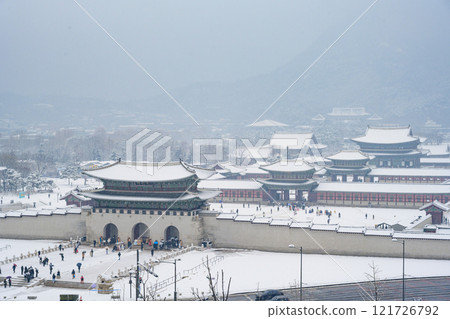 Winter snow at Gyeongbokgung Palace in Seoul, South Korea. Geunjeongjeon Pavilion of Gyeongbokgung South Korea's historical landmarks Winter snow at Gyeongbokgung Palace in Seoul, South Korea. Geunjeongjeon Pavilion of Gyeongbokgung South Korea's historical landmarks 121726792