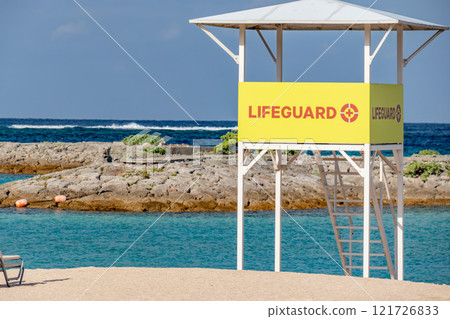 Okinawa's blue sky and blue sea, and a lifeguard station to protect beach safety Okinawa's blue sky and blue sea, and a lifeguard station to protect beach safety 121726833
