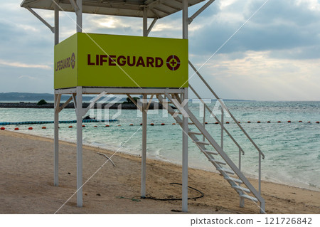 Okinawa's blue sky and blue sea, and a lifeguard station to protect beach safety Okinawa's blue sky and blue sea, and a lifeguard station to protect beach safety 121726842