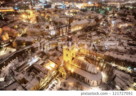 Aerial night View of Tallinn in winter, roofs are covered with snow, Christmas mood Aerial night View of Tallinn in winter, roofs are covered with snow, Christmas mood 121727091