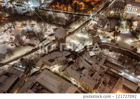 Aerial night View of Tallinn in winter, roofs are covered with snow, Christmas mood 121727092