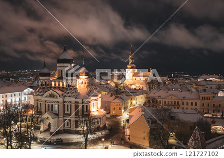Aerial night View of Tallinn in winter with Alexander Nevsky Cathedral, roofs with snow, Christmas mood Aerial night View of Tallinn in winter with Alexander Nevsky Cathedral, roofs with snow, Christmas mood 121727102