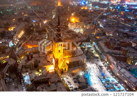 Aerial night View of Tallinn in winter, roofs are covered with snow, Christmas mood Aerial night View of Tallinn in winter, roofs are covered with snow, Christmas mood 121727104