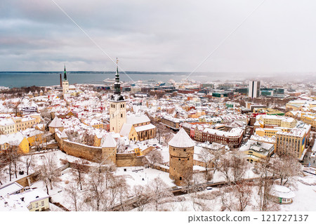 Aerial View of Tallinn in winter, roofs are covered with snow, Christmas mood Aerial View of Tallinn in winter, roofs are covered with snow, Christmas mood 121727137