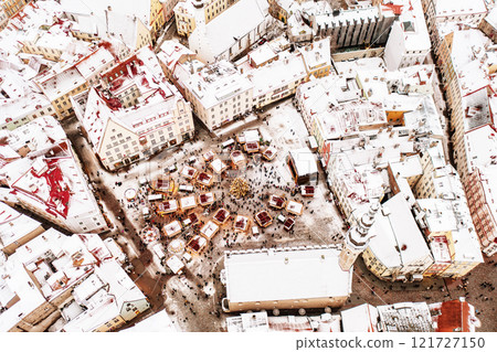Aerial View of Tallinn with the Town Hall Square in winter, roofs with snow, Christmas mood Aerial View of Tallinn with the Town Hall Square in winter, roofs with snow, Christmas mood 121727150