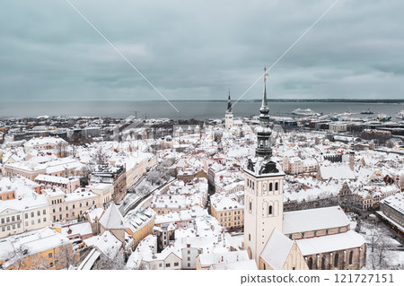 Aerial View of Tallinn in winter, roofs are covered with snow, Christmas mood 121727151