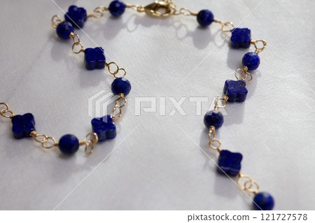 Flower-shaped small lapis lazuli long necklace Flower-shaped small lapis lazuli long necklace 121727578