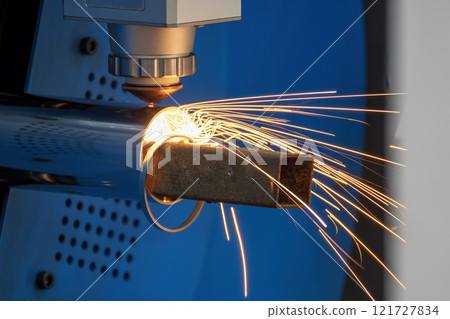 Close up scene the fiber laser cutting machine cut the stainless steel tube and sparkling light. Close up scene the fiber laser cutting machine cut the stainless steel tube and sparkling light. 121727834