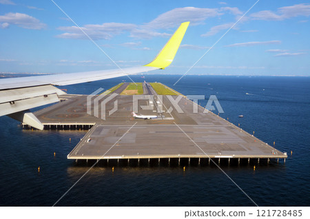 Runway and wings of Haneda Airport, aerial view 121728485