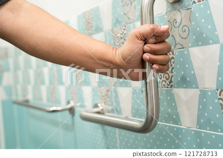Asian elderly woman use toilet bathroom handle security, healthy strong medical. Asian elderly woman use toilet bathroom handle security, healthy strong medical. 121728713