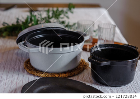 Kitchenware, pots, enameled cast iron pots Kitchenware, pots, enameled cast iron pots 121728814