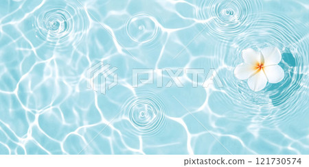 Pink flowers floating on water surface with ripples, perfect for SPA background 121730574