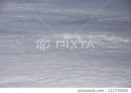 Sea of clouds over Brazil seen from an airplane window 121730690