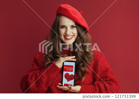 happy woman with long wavy hair, smartphone and Valentine app happy woman with long wavy hair, smartphone and Valentine app 121731399