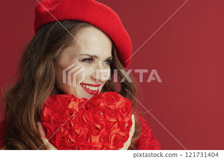 happy trendy 40 years old woman in red sweater and beret happy trendy 40 years old woman in red sweater and beret 121731404