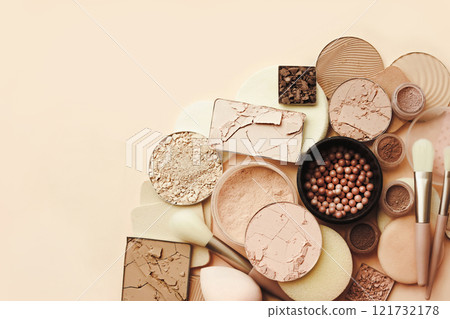 Varieties of face powders and foundations for perfect complexion, basic make up products to even out and matte skin, beauty cosmetics with brushes and sponges, selective focus 121732178