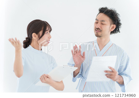 Man and nurse undergoing examination (health check, medical, patient, prostate cancer) Man and nurse undergoing examination (health check, medical, patient, prostate cancer) 121734960