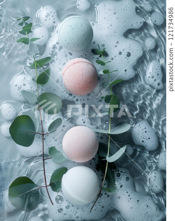 Bath Bombs with Eucalyptus Leaves on Water Surface with Foam 121734986