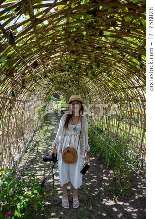 Bali, Indonesia - October 22, 2024: Bamboo and rattan tunnel at Maha Gangga Valley restaurant Bali, Indonesia - October 22, 2024: Bamboo and rattan tunnel at Maha Gangga Valley restaurant 121738028