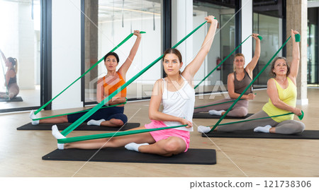 Aerobics pilates women with rubber bands Aerobics pilates women with rubber bands 121738306