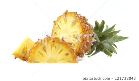 Fresh Pineapple with Slices on a White Background 121738848
