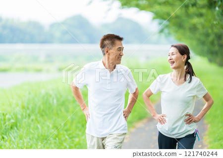 Senior couple walking Senior couple walking 121740244