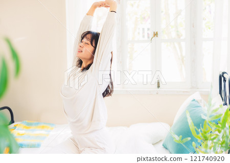 Woman waking up Woman waking up 121740920