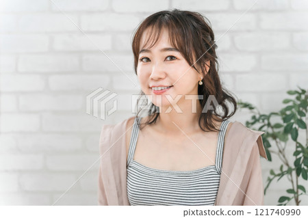 Smiling Japanese woman with her hair done Smiling Japanese woman with her hair done 121740990