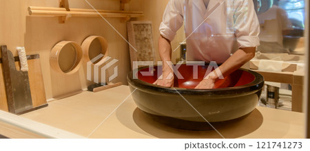 Soba making, a soba craftsman kneading the dough 121741273