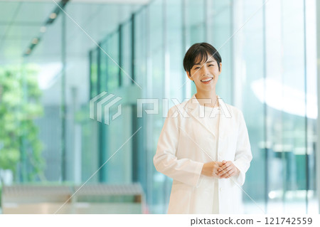 A young lady in white 121742559