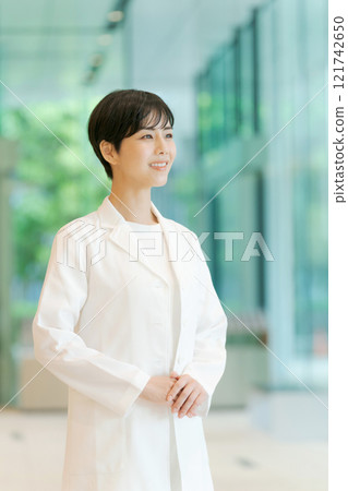 A young lady in white A young lady in white 121742650