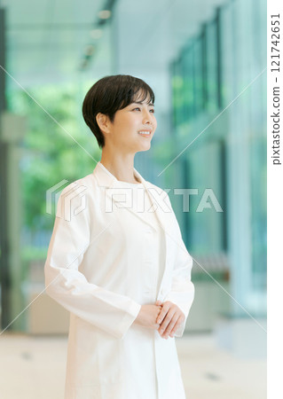 A young lady in white A young lady in white 121742651