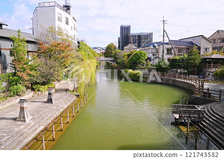 Kyoto, Fushimi, "Fushimi Minato Park" seen from Kyobashi, including the Sanjukoku boat dock (early winter) 121743582