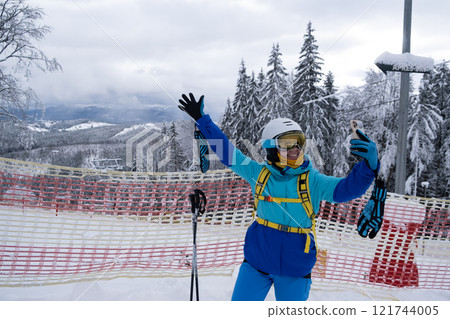 Ski Enthusiast Taking Selfie on Snowy Mountain Ski Enthusiast Taking Selfie on Snowy Mountain 121744005