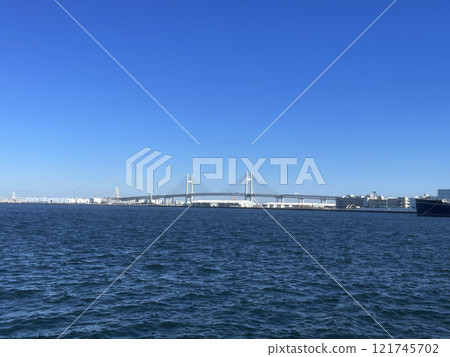 sea with a bridge across the bay in Japan, Yokohama city 121745702