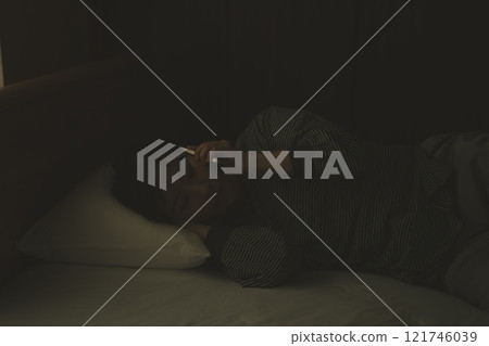 Calling in bed in the middle of the night 121746039