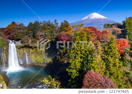 Kamiide, Fujinomiya City, Shizuoka Prefecture - A view of Otodome Falls with vibrant autumn leaves and the backdrop of Mount Fuji, a World Heritage Site Kamiide, Fujinomiya City, Shizuoka Prefecture - A view of Otodome Falls with vibrant autumn leaves and the backdrop of Mount Fuji, a World Heritage Site 121747605