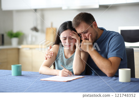 Sar interracial couple reading paper contract 121748352