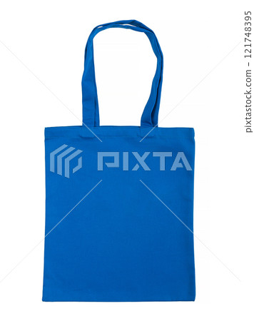 Blue canvas bag is isolated on a white background. Blue canvas bag is isolated on a white background. 121748395