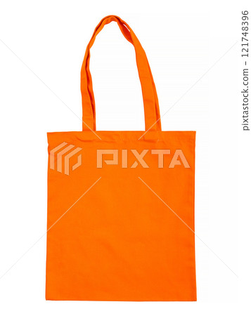 Orange canvas bag is isolated on a white background. Orange canvas bag is isolated on a white background. 121748396