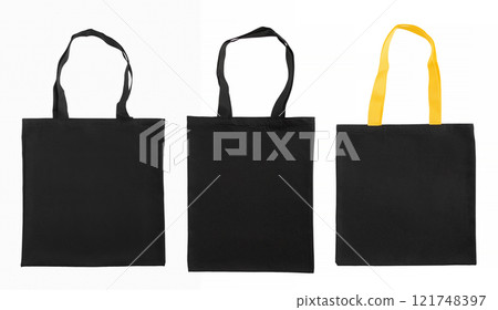 Black canvas bags isolated on a white background. Black canvas bags isolated on a white background. 121748397