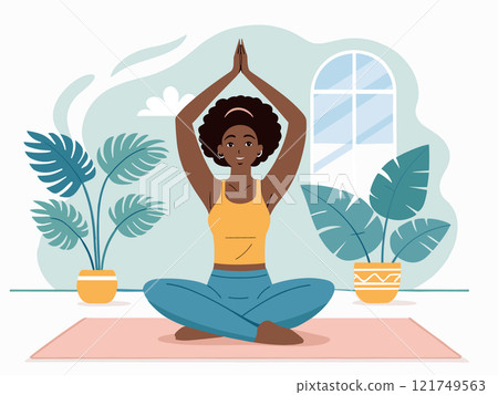 African woman doing yoga exercises African woman doing yoga exercises 121749563
