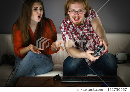 Woman is angry at playing man Woman is angry at playing man 121750967