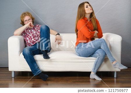 Woman and man after argue on sofa 121750977