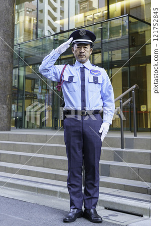 Full-body photo of a middle-aged male security guard Photo courtesy of Denpa Gakuen, Tokyo Electronics College Full-body photo of a middle-aged male security guard Photo courtesy of Denpa Gakuen, Tokyo Electronics College 121752845