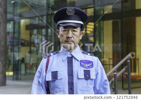 Middle-aged male security guard. Photo courtesy of Denpa Gakuen, Tokyo Electronics College. 121752848