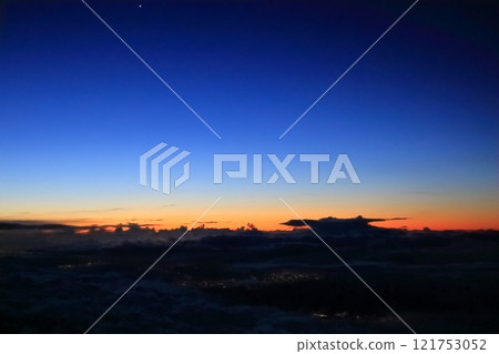 A setting sunset 121753052