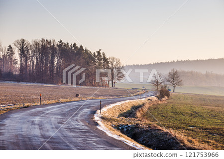 Winding road through rolling countryside in Region Pilsen in Czech Republic, Europe. Winding road through rolling countryside in Region Pilsen in Czech Republic, Europe. 121753966