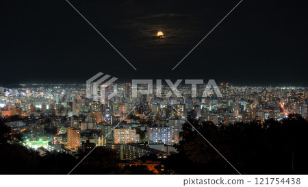 Night view and full moon from the observation deck Night view and full moon from the observation deck 121754438